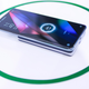 A photo of an Oppo smartphone charging with its new MagVOOC tech
